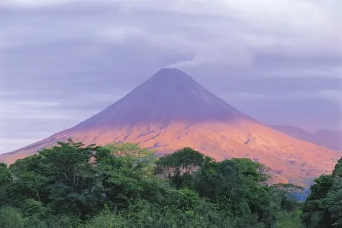 Framed Print : Sunset light peers through the clouds to illuminate the flanks of Arenal Volcano (1 Framed Print : Sunset light peers through the clouds to illuminate the flanks of Arenal Volcano (1