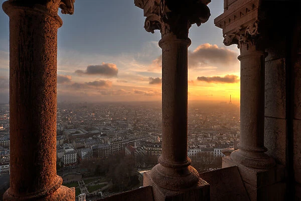 Sunset in Paris, France. from the screecher with distant Eiffel Tower