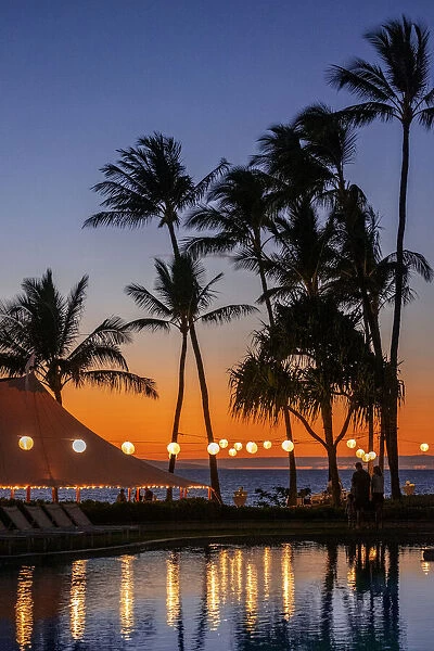 Sunset reflected in resort pool, Maui, Hawaii, USA