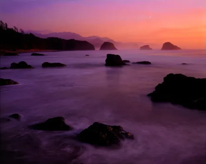 Framed Print : Sunset over sea stack rocks of Ecola Beach State Park looking towards Cannon Beach