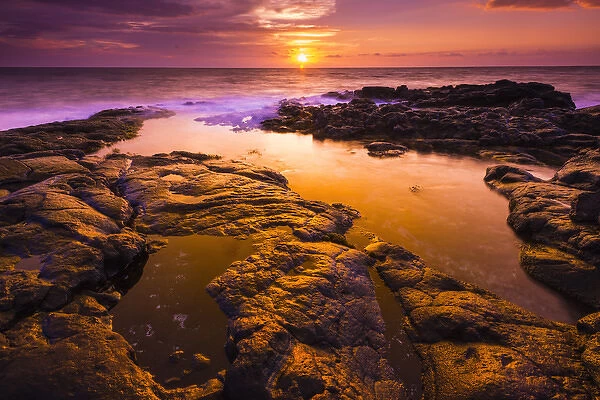 Sunset and tide pool above the Pacific, Kailua-Kona, Hawaii USA