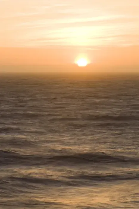 Framed Print : Sunset over the turbulent surf of the Pacific Ocean - San Francisco, California