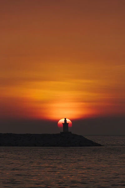 Sunset view of lighthouse in Manila Bay, Manila, Philippines