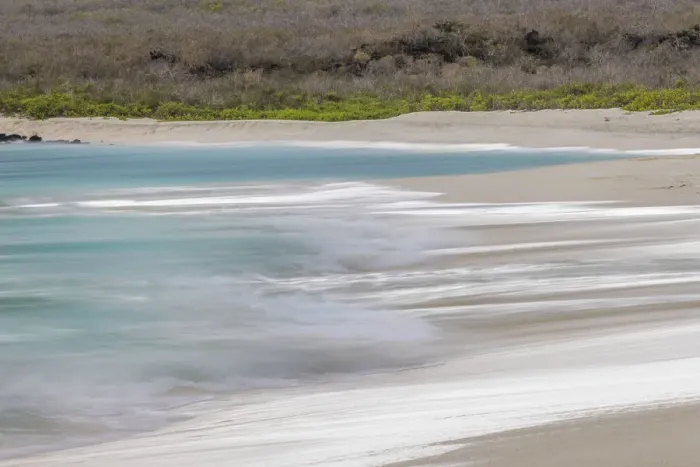 Framed Print : Surf pattern washing up on white sandy beach, Espanola Island, Galapagos Islands, Ecuador