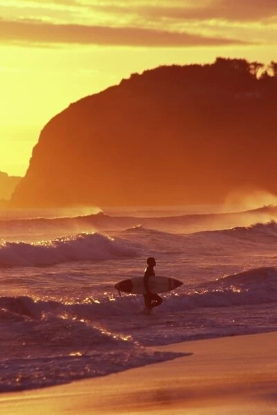 Surfer at Sunset, St Kilda Beach, Dunedin, New Zealand