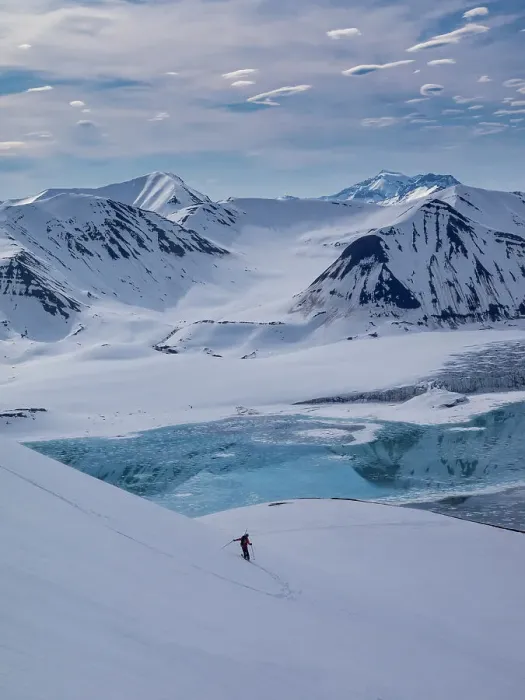 Framed Print : Svalbard, Norway. Guide and skier enjoys a pristine slope Framed Print : Svalbard, Norway. Guide and skier enjoys a pristine slope
