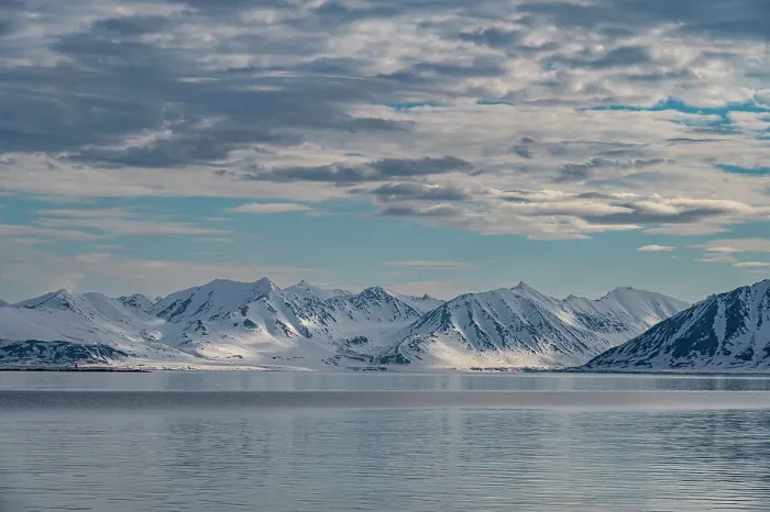 Framed Print : Svalbard, Norway. Landscape of mountain, water and clouds