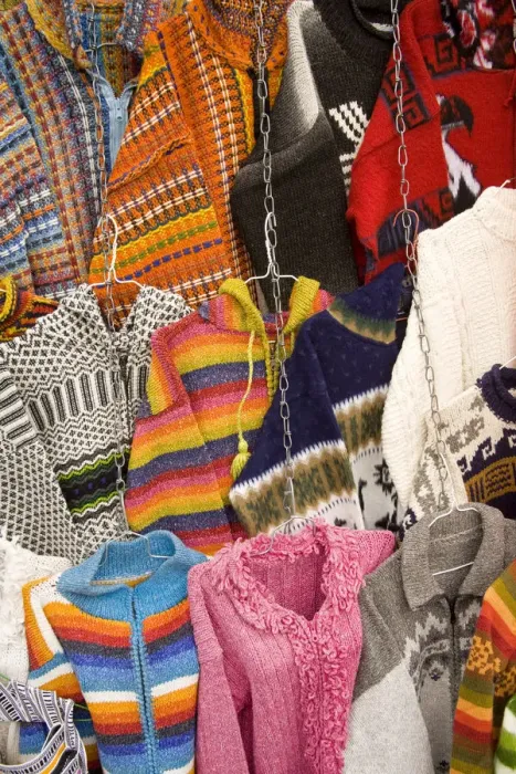 Framed Print : Sweaters and ponchos on display at market, Plaza de San Francisco, Cuenca, Ecuador Framed Print : Sweaters and ponchos on display at market, Plaza de San Francisco, Cuenca, Ecuador