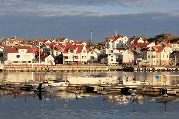 Sweden, Bohuslan, Island of Tjorn. Views over Skarhamn fishing villages rooftops