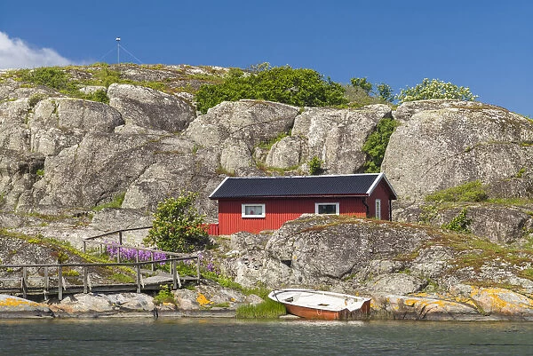 Sweden, Bohuslan, Marstrand, red coastal fishing shack