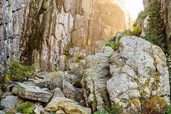 Sweden, Bohuslan Province. Path through wedged rocks near Uddevalla