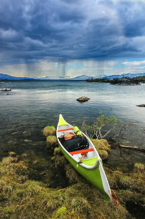 Framed Print : Sweden, Norrbotten, Abisko, Stordalen Nature Preserve. Canoe on shoreline of Torne Lake Framed Print : Sweden, Norrbotten, Abisko, Stordalen Nature Preserve. Canoe on shoreline of Torne Lake