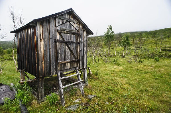 Sweden, Norrbotten. A traditional storage hut next to Snurijokkatan