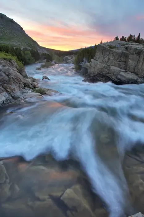 Framed Print : Swiftcurrent Falls catches mornings first light in the Many Glacier Valley of Glacier Framed Print : Swiftcurrent Falls catches mornings first light in the Many Glacier Valley of Glacier