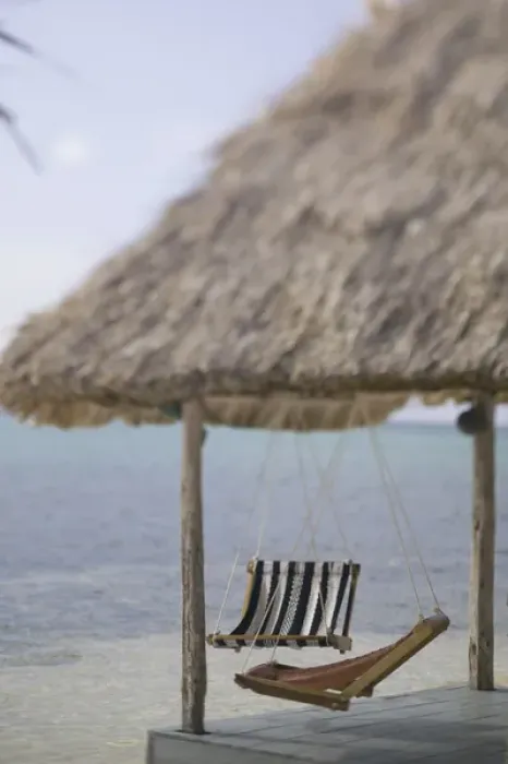 Framed Print : Swinging Chairs at Turneffe Caye resort, Belize