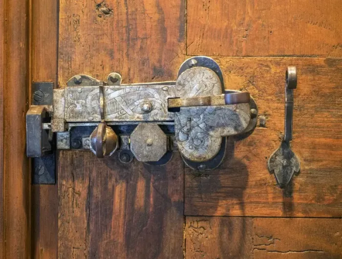 Framed Print : Switzerland, Bern Canton, Spiez, Spiez Castle, wood door with ornate hardware