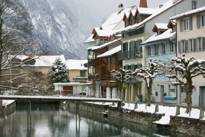 Framed Print : SWITZERLAND-Bern-INTERLAKEN: Town Buildings along Aare River  /  Winter