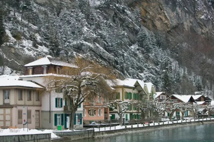 Framed Print : SWITZERLAND-Bern-INTERLAKEN: Town Buildings along Aare River  /  Winter