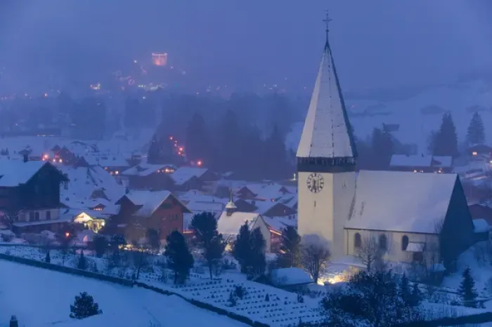 Framed Print : SWITZERLAND-Bern-SaNEN (Area around Gstaad): Town Church  /  Winter  /  Evening