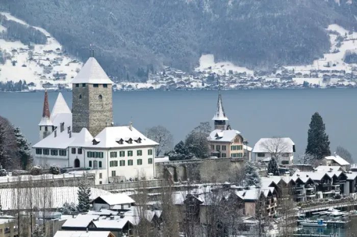 Framed Print : SWITZERLAND-Bern-SPIEZ: Town Castle (13th century) & Lake Thun  /  Winter