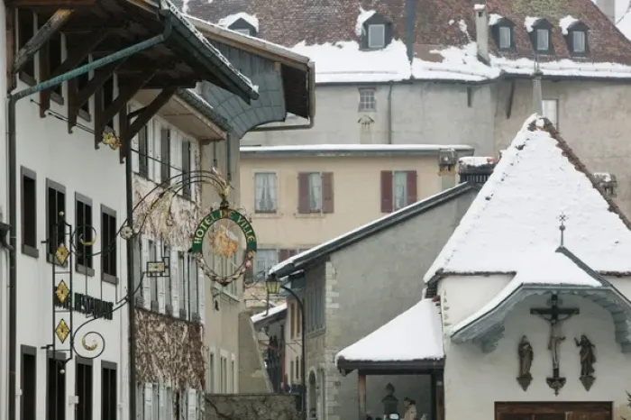 Framed Print : SWITZERLAND-Fribourg-GRUYERES: Buildings along Main Street / Winter Framed Print : SWITZERLAND-Fribourg-GRUYERES: Buildings along Main Street / Winter