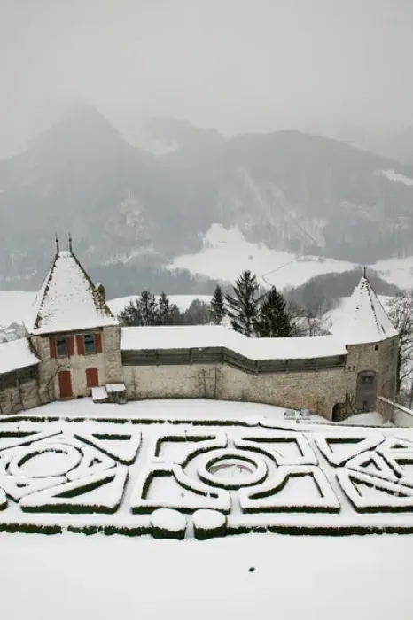 Framed Print : SWITZERLAND-Fribourg-GRUYERES: Castle Gardens under Snow: Gruyeres Castle  /  Winter