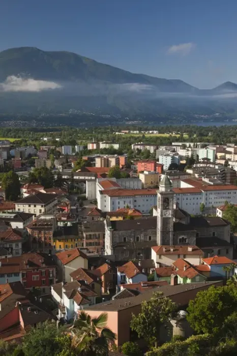 Framed Print : SWITZERLAND, Ticino Canton, Locarno. High angle town view, morning Framed Print : SWITZERLAND, Ticino Canton, Locarno. High angle town view, morning