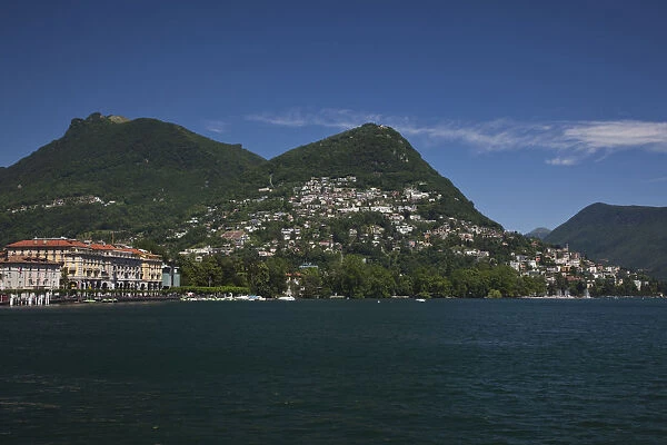 SWITZERLAND, Ticino Canton, Lugano. Town view from Lake Lugano