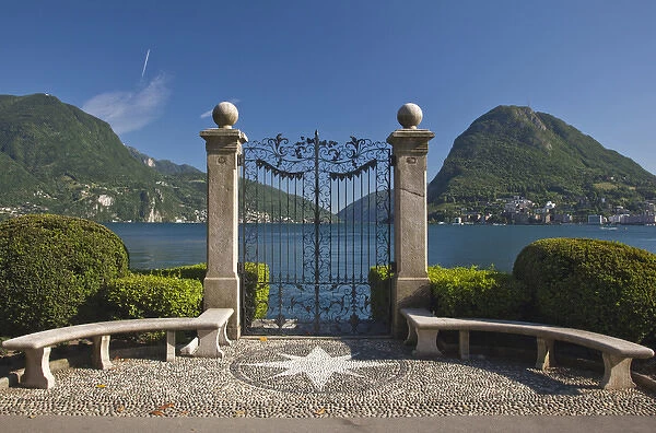 SWITZERLAND, Ticino Canton, Lugano. View towards Monte San Salvador though gates