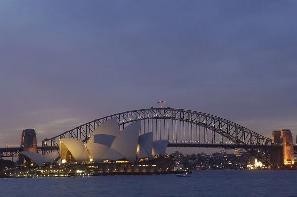Sydney Opera House with Sydney Harbour Bridge at dusk. Sydney NSW AUSTRALIA