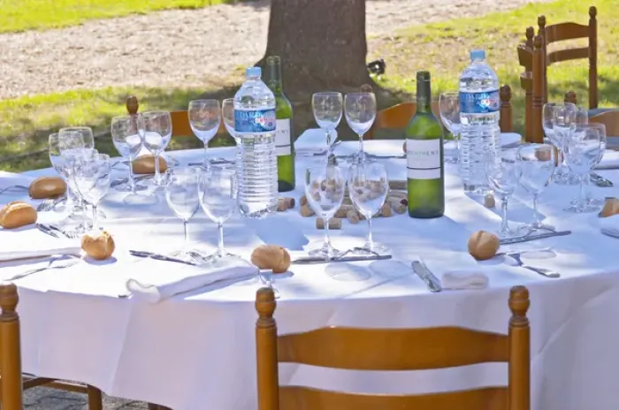 Framed Print : A table set for lunch in the garden a sunny autumn day - Chateau Pey la Tour, previously