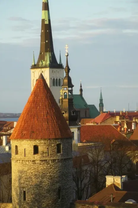 Framed Print : Tallinn cityscape dominated by St. Olafs Church and city wall towers, Estonia Framed Print : Tallinn cityscape dominated by St. Olafs Church and city wall towers, Estonia