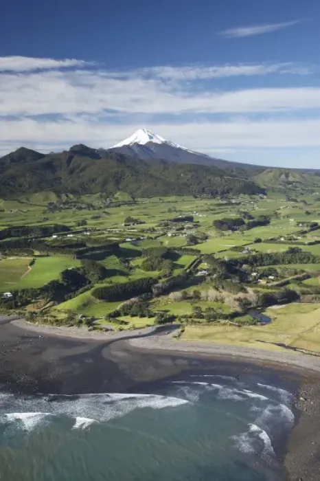 Framed Print : Taranaki Coastline near Oakura near New Plymouth, Farmland and Mt Taranaki  /  Mt Egmont