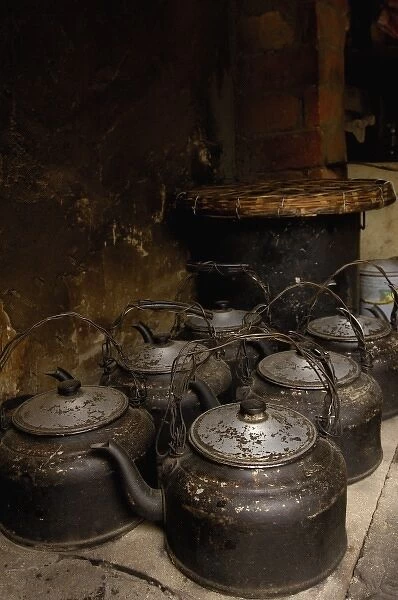 Tea kettles in restaurant. Jianshui. Yunnan Province. CHINA