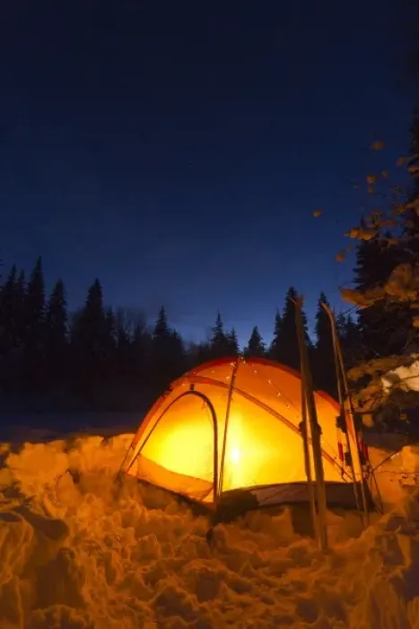 Framed Print : Tent glows at dusk during winter camping near West Glacier, Montana, USA Framed Print : Tent glows at dusk during winter camping near West Glacier, Montana, USA