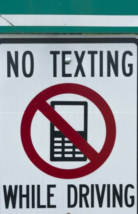Framed Print : NO TEXTING WHILE DRIVING sign dangerous practice Framed Print : NO TEXTING WHILE DRIVING sign dangerous practice