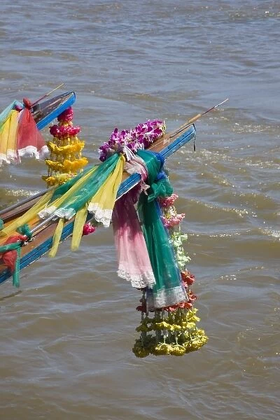 Thailand, Bangkok. Good luck blessings affixed to the bow of long-tail boats on the
