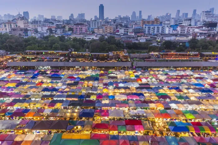 Framed Print : Thailand, Bangkok. Royal City Avenue, Talat Rot Fai 2 outdoor market at dusk