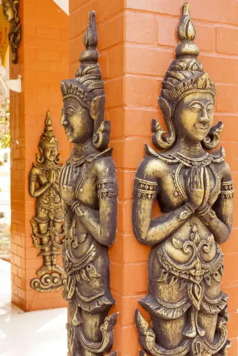 Framed Print : Thailand, Nong Khai Province. Relief statues ornament walls. Phra That Bang Phuan temple