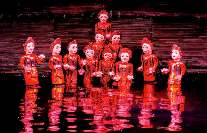 Framed Print : Thang Long Water Puppet Theatre, Hanoi, Vietnam. Portrait of group of water puppets and their reflection in the water after performance Framed Print : Thang Long Water Puppet Theatre, Hanoi, Vietnam. Portrait of group of water puppets and their reflection in the water after performance