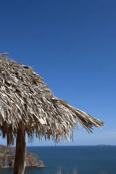 Thatch-roof hut overlooking the ocean in the heart of the Guanacaste Gold Coast