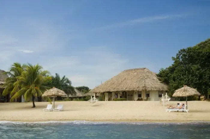 Framed Print : Thatched palapas, cabana and lounge chairs on beach, viewed from Caribbean Sea, Jaguar Reef Lodge Framed Print : Thatched palapas, cabana and lounge chairs on beach, viewed from Caribbean Sea, Jaguar Reef Lodge