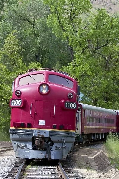 The Thunder Mountain Line scenic tourist train traveling along the Payette River