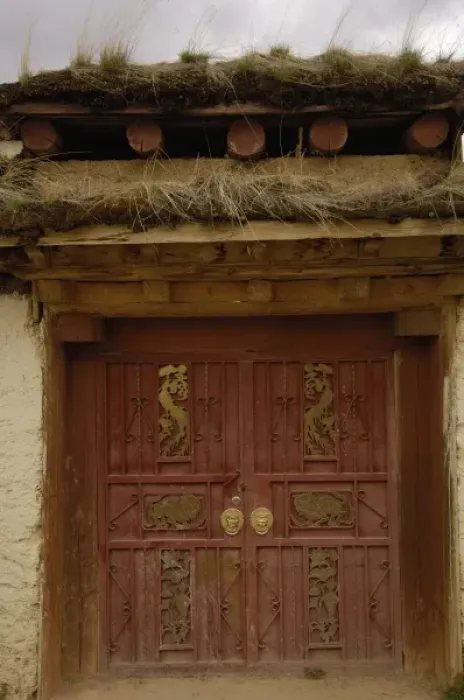 Framed Print : Tibetan house door ornately carved. Zhongdian. Deqin Tibetan Autonymous Prefecture