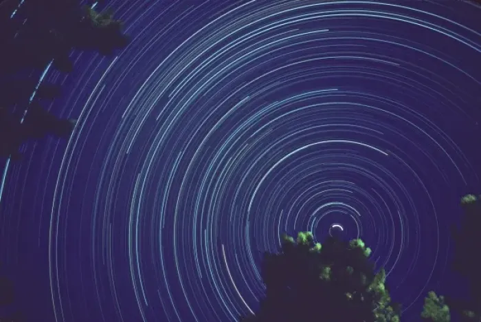 Framed Print : Time exposure centered on North Star night star tracks from earths rotation Framed Print : Time exposure centered on North Star night star tracks from earths rotation