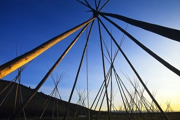 Tipi poles at sunrise at the Bighole National Battlefield Site near Wisdom Montana
