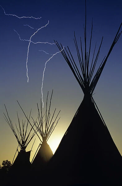 Tipis at sunset at Browning Montana (lightning added digitally)