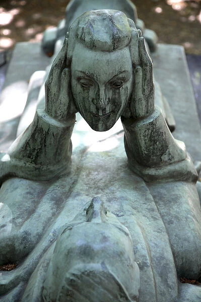 A tomb sculpture in Cimtiere du Pere Lachaise. Paris. France