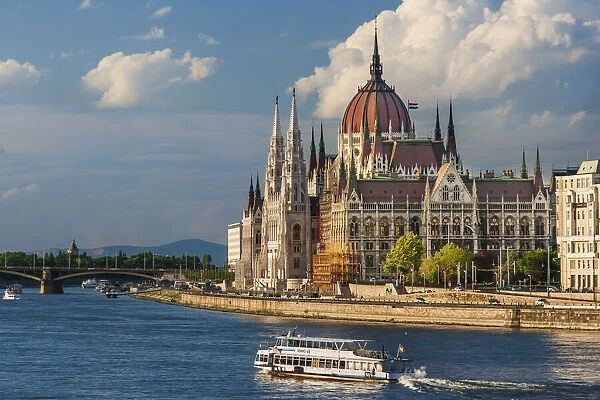 Tour boat passes Hungarys Parliament, built between 1884-1902 is the country