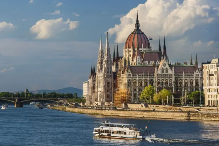 Framed Print : Tour boat passes Hungarys Parliament, built between 1884-1902 is the country